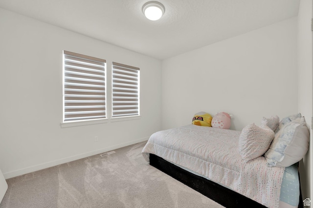 7405 W Glowing Sky Dr S, West Valley City, UT 84081 - carpeted bedroom featuring baseboards