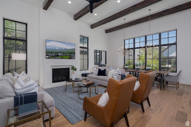 517 N Farm Hill Ln, Midway, UT 84049 - living area featuring a chandelier, light wood-type flooring, beamed ceiling, recessed lighting, and plenty of natural light