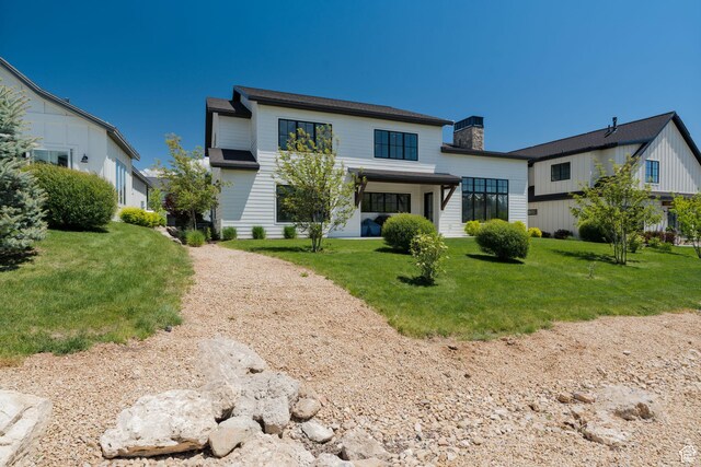 517 N Farm Hill Ln, Midway, UT 84049 - back of property with a chimney and a yard