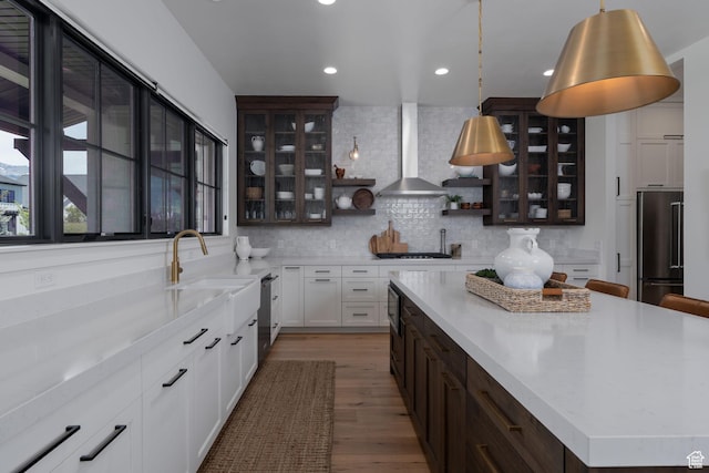 517 N Farm Hill Ln, Midway, UT 84049 - kitchen with dark brown cabinetry, appliances with stainless steel finishes, open shelves, wood finished floors, and tasteful backsplash