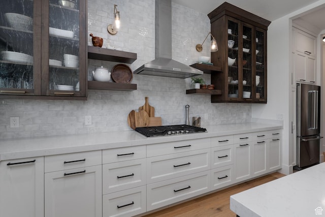 517 N Farm Hill Ln, Midway, UT 84049 - kitchen featuring wall chimney exhaust hood, stainless steel appliances, open shelves, and backsplash