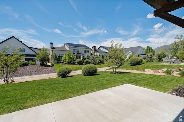 517 N Farm Hill Ln, Midway, UT 84049 - view of grassy yard featuring a patio area and a residential view