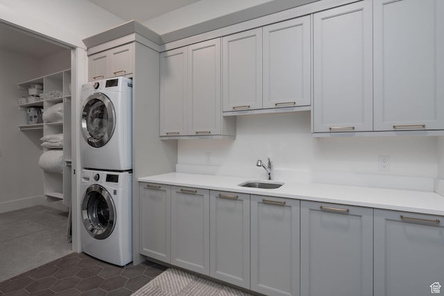 517 N Farm Hill Ln, Midway, UT 84049 - laundry room with stacked washer / drying machine, cabinet space, and dark tile patterned floors