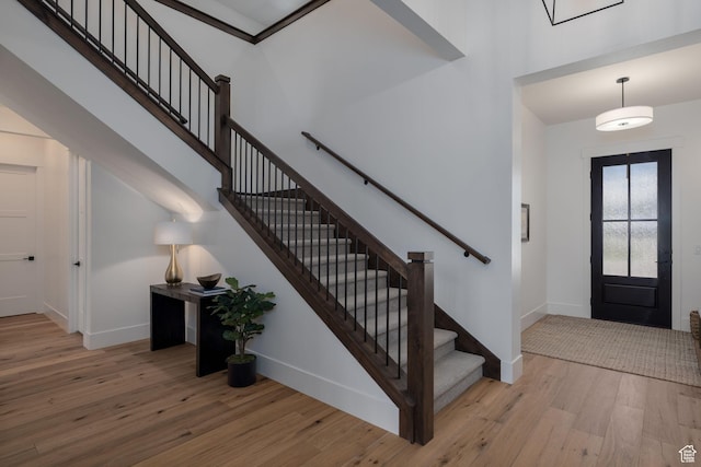 517 N Farm Hill Ln, Midway, UT 84049 - entrance foyer with wood finished floors, stairs, and baseboards