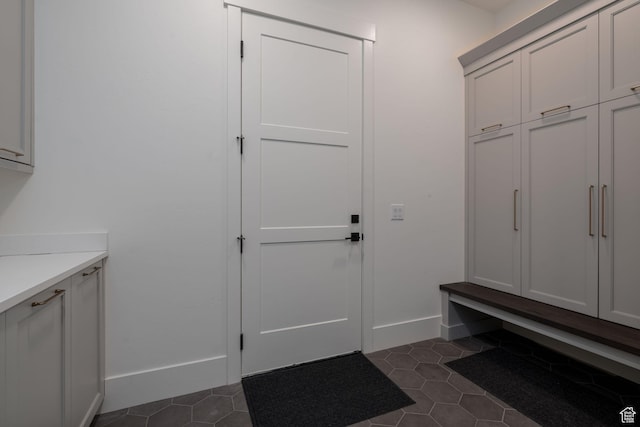 517 N Farm Hill Ln, Midway, UT 84049 - mudroom featuring baseboards and dark tile patterned flooring