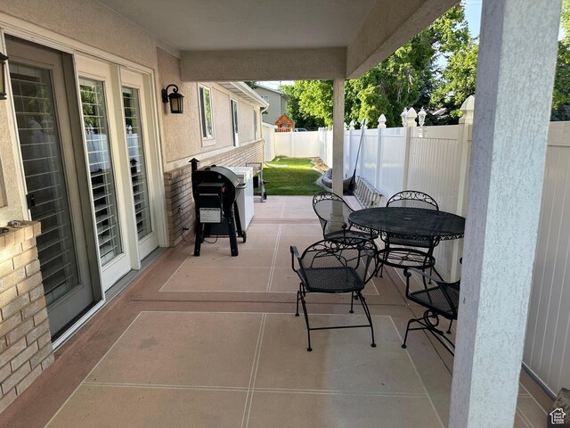 756 W 4375 S, Riverdale, UT 84405 - fenced backyard with grilling area, a patio, and outdoor dining area