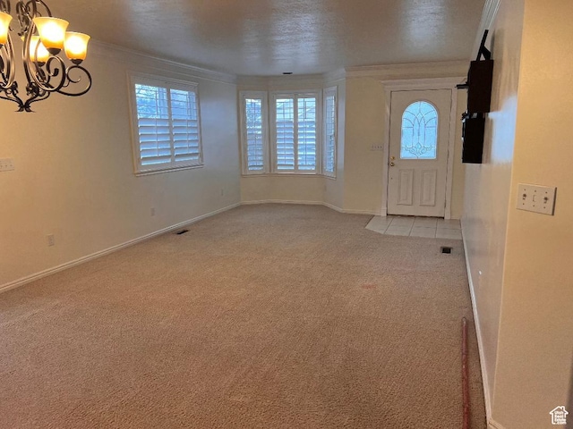 756 W 4375 S, Riverdale, UT 84405 - carpeted entrance foyer featuring a chandelier, crown molding, and baseboards