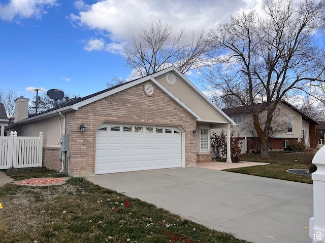 756 W 4375 S, Riverdale, UT 84405 - single story home with brick siding, driveway, a garage, and a chimney