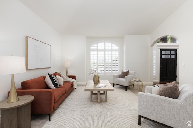 2188 E Tuscany Creek Way S, Draper, UT 84020 - living room with healthy amount of natural light, arched walkways, and baseboards
