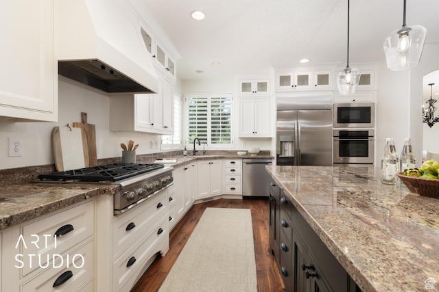 2188 E Tuscany Creek Way S, Draper, UT 84020 - kitchen featuring stainless steel appliances, premium range hood, dark wood finished floors, light stone countertops, and white cabinets