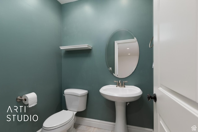 2188 E Tuscany Creek Way S, Draper, UT 84020 - half bathroom featuring toilet, baseboards, and tile patterned flooring