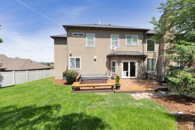 2188 E Tuscany Creek Way S, Draper, UT 84020 - back of property with a hot tub, a wooden deck, and stucco siding