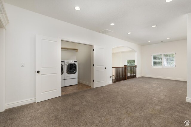 2188 E Tuscany Creek Way S, Draper, UT 84020 - carpeted spare room with washing machine and dryer, arched walkways, recessed lighting, and baseboards