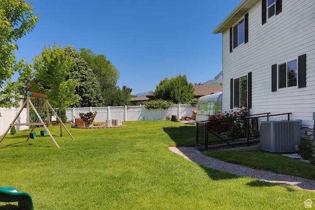 1062 Creek View Dr, Fruit Heights, UT 84037 - view of yard featuring central AC and a playground