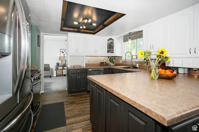 1062 Creek View Dr, Fruit Heights, UT 84037 - kitchen with appliances with stainless steel finishes, a sink, white cabinetry, and dark wood-type flooring