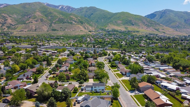 1062 Creek View Dr, Fruit Heights, UT 84037 - aerial view of property and surrounding area with a mountain backdrop and nearby suburban area