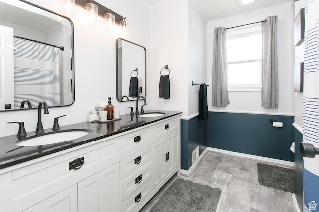 1062 Creek View Dr, Fruit Heights, UT 84037 - full bath with ornamental molding, double vanity, and baseboards