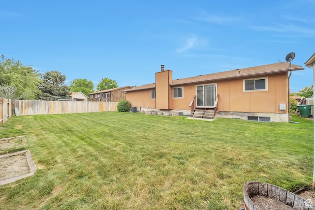 5373 S Clover Meadow Dr W, Murray, UT 84123 - back of property featuring a chimney and entry steps