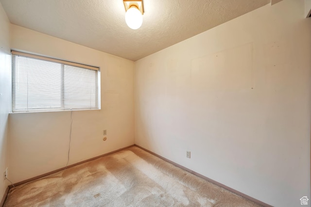 5373 S Clover Meadow Dr W, Murray, UT 84123 - empty room with carpet, baseboards, and a textured ceiling