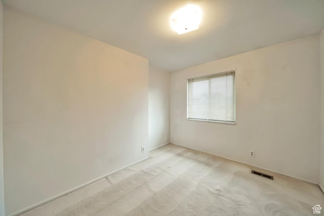 5373 S Clover Meadow Dr W, Murray, UT 84123 - spare room with light carpet