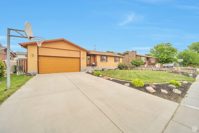 5373 S Clover Meadow Dr W, Murray, UT 84123 - ranch-style home featuring brick siding, an attached garage, and concrete driveway
