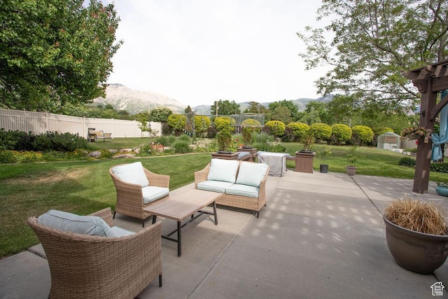3234 N 550 W, Pleasant View, UT 84414 - view of patio / terrace with a mountain view and an outdoor hangout area