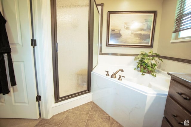 3234 N 550 W, Pleasant View, UT 84414 - bathroom featuring a stall shower, a garden tub, tile patterned flooring, and vanity