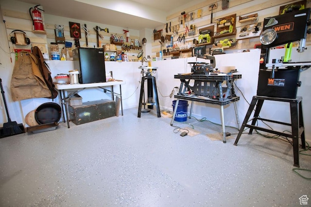 3234 N 550 W, Pleasant View, UT 84414 - miscellaneous room featuring speckled floor and a workshop area