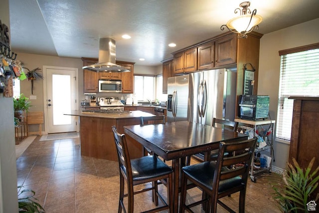 3234 N 550 W, Pleasant View, UT 84414 - dining space featuring dark tile patterned flooring, recessed lighting, and baseboards