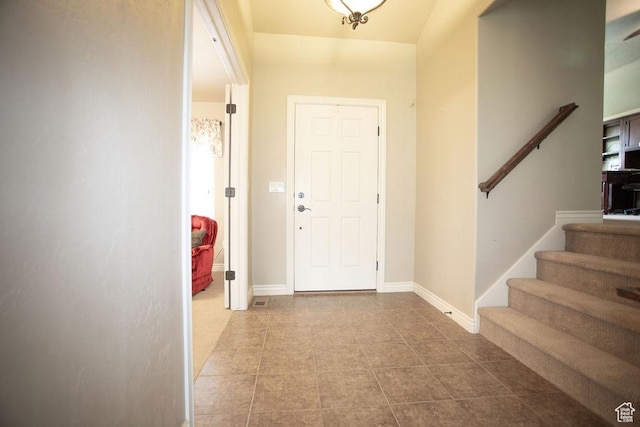3234 N 550 W, Pleasant View, UT 84414 - foyer entrance featuring stairs and tile patterned floors