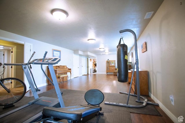3234 N 550 W, Pleasant View, UT 84414 - workout area featuring baseboards and wood finished floors