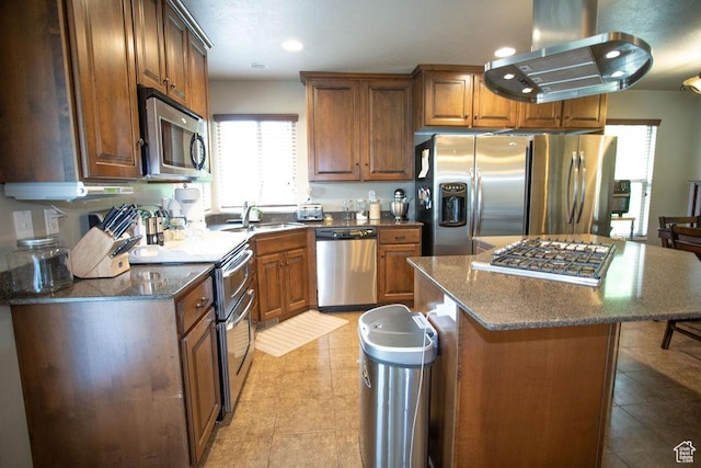 3234 N 550 W, Pleasant View, UT 84414 - kitchen featuring appliances with stainless steel finishes, island exhaust hood, a sink, light tile patterned floors, and recessed lighting