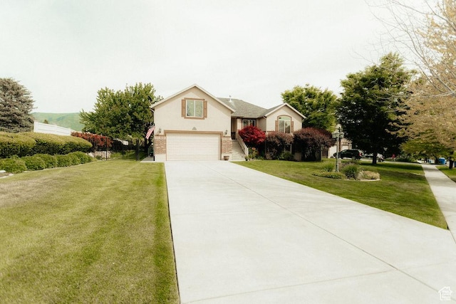 3234 N 550 W, Pleasant View, UT 84414 - view of front of property with an attached garage, concrete driveway, a front yard, and brick siding