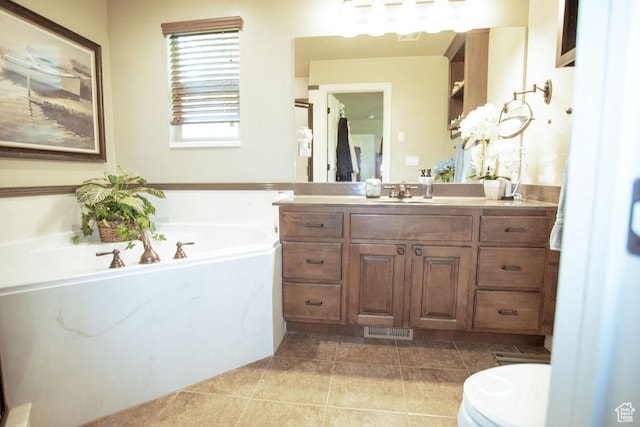 3234 N 550 W, Pleasant View, UT 84414 - full bath with vanity, a garden tub, tile patterned flooring, and toilet