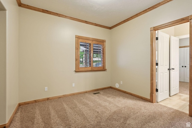 870 E Quail Hollow Cir, Alpine, UT 84004 - spare room with light colored carpet, ornamental molding, and baseboards