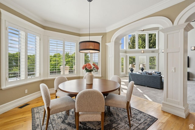 870 E Quail Hollow Cir, Alpine, UT 84004 - dining space featuring decorative columns, healthy amount of natural light, crown molding, and light wood-style floors