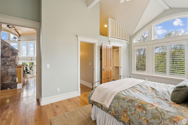 870 E Quail Hollow Cir, Alpine, UT 84004 - bedroom with light wood-style floors, high vaulted ceiling, and baseboards
