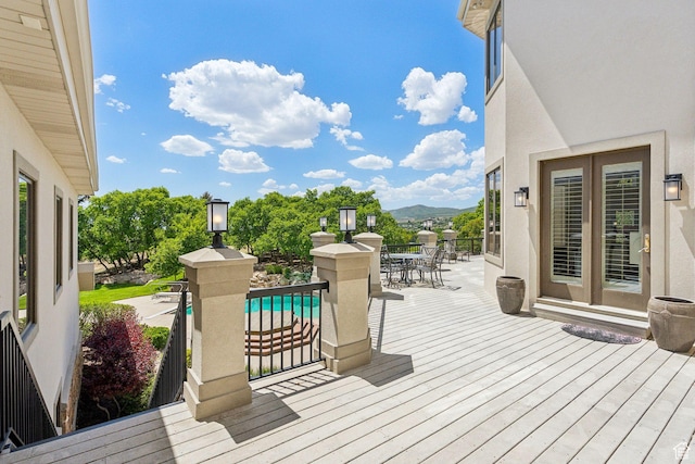 870 E Quail Hollow Cir, Alpine, UT 84004 - wooden terrace featuring outdoor dining space, a mountain view, and an outdoor pool
