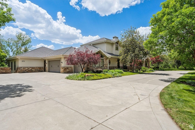 870 E Quail Hollow Cir, Alpine, UT 84004 - view of front of property featuring stone siding, stucco siding, concrete driveway, and a garage
