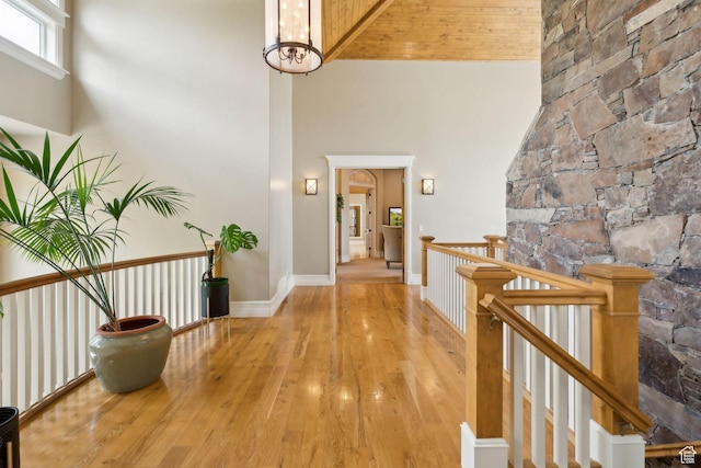 870 E Quail Hollow Cir, Alpine, UT 84004 - corridor featuring a high ceiling, hardwood / wood-style flooring, and an upstairs landing