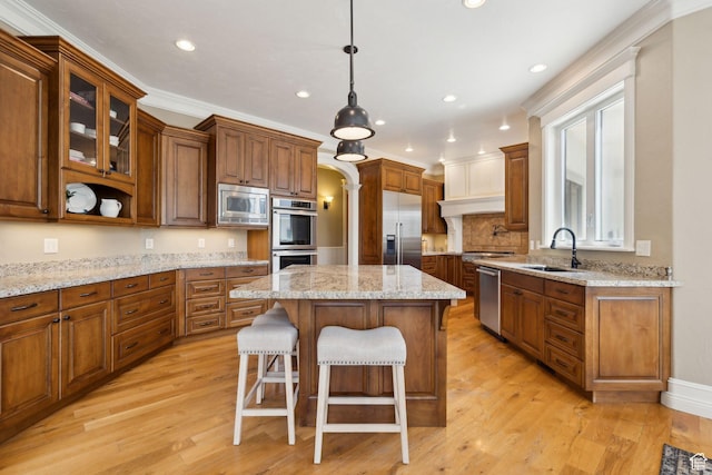 870 E Quail Hollow Cir, Alpine, UT 84004 - kitchen featuring built in appliances, recessed lighting, a sink, a center island, and a breakfast bar