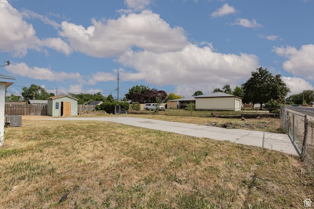 4815 W 4895 S, Kearns, UT 84118 - view of yard featuring concrete driveway and cooling unit