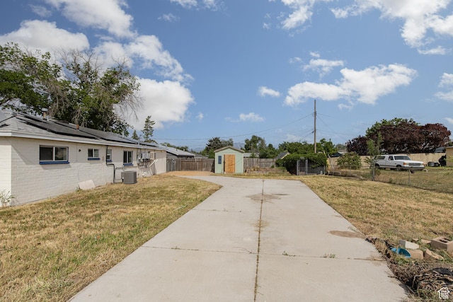4815 W 4895 S, Kearns, UT 84118 - view of yard featuring concrete driveway and cooling unit