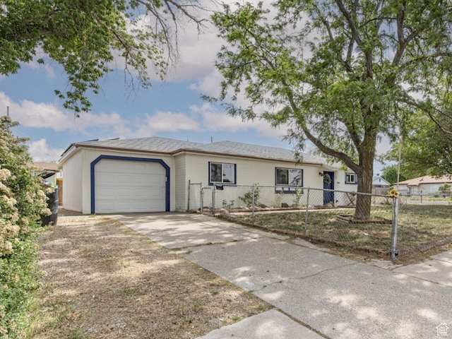 4815 W 4895 S, Kearns, UT 84118 - ranch-style home with driveway, a garage, and a fenced front yard