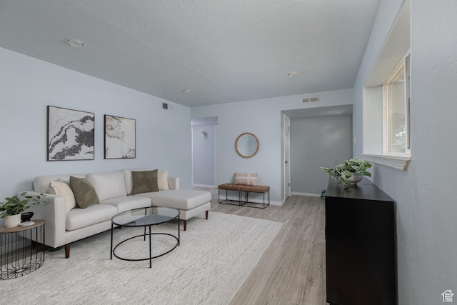 4815 W 4895 S, Kearns, UT 84118 - living area featuring light wood finished floors and baseboards