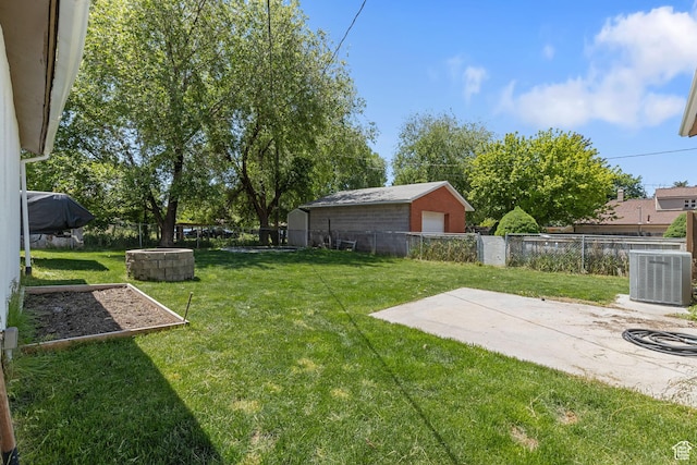 1250 E Center St, Springville, UT 84663 - view of yard featuring central AC unit, a garage, and a patio