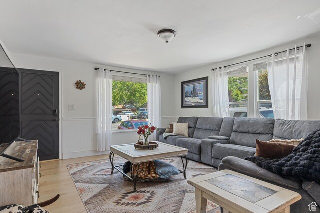 1250 E Center St, Springville, UT 84663 - living area featuring light wood-type flooring and wainscoting