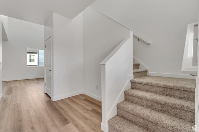 6737 S Glade Creek Dr W Unit 226, West Jordan, UT 84081 - stairs with wood finished floors and baseboards