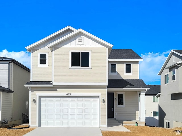 6737 S Glade Creek Dr W Unit 226, West Jordan, UT 84081 - traditional-style home with concrete driveway, a garage, a shingled roof, and board and batten siding