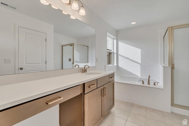 6737 S Glade Creek Dr W Unit 226, West Jordan, UT 84081 - full bathroom featuring vanity, a bath, a shower stall, tile patterned floors, and recessed lighting